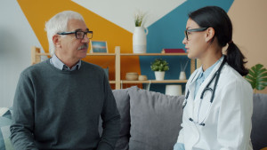 New Public Charge Screening at U.S. Embassies in 2026: Who Is at Risk and How to Prepare 2 Immigrant visa applicant discussing medications and chronic medical conditions with an authorized panel physician